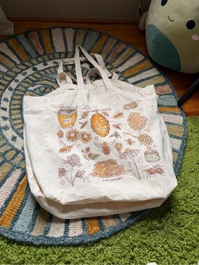 EARTHBOUND Cream Canvas Tote with Yellow & Brown Honeybee Illustration